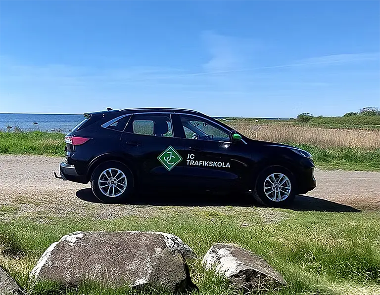 Körskolebil automatväxlad Ford Kuga Laddhybrid